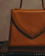 "Yves Saint Laurent" 70's-80's Cognac leather top handle bag
