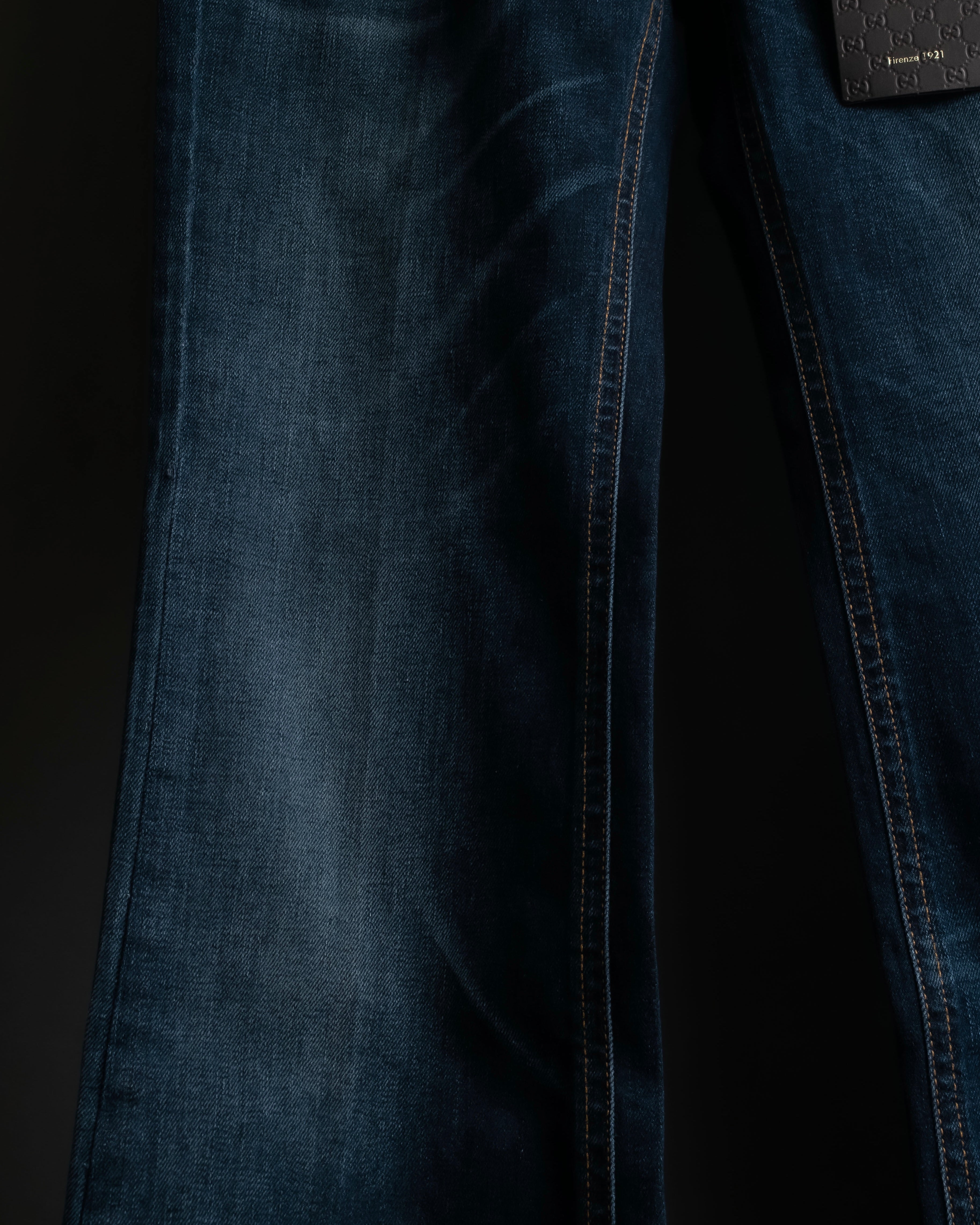 Pantalones de mezclilla con lavado de libélula de GUCCI