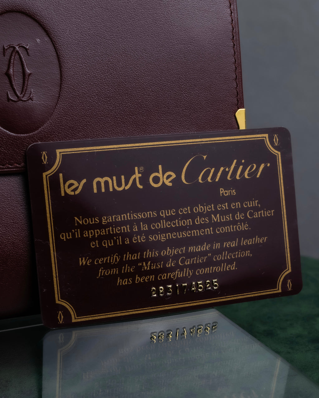 "Cartier" Les Must de Cartier bordeaux color leather wallet