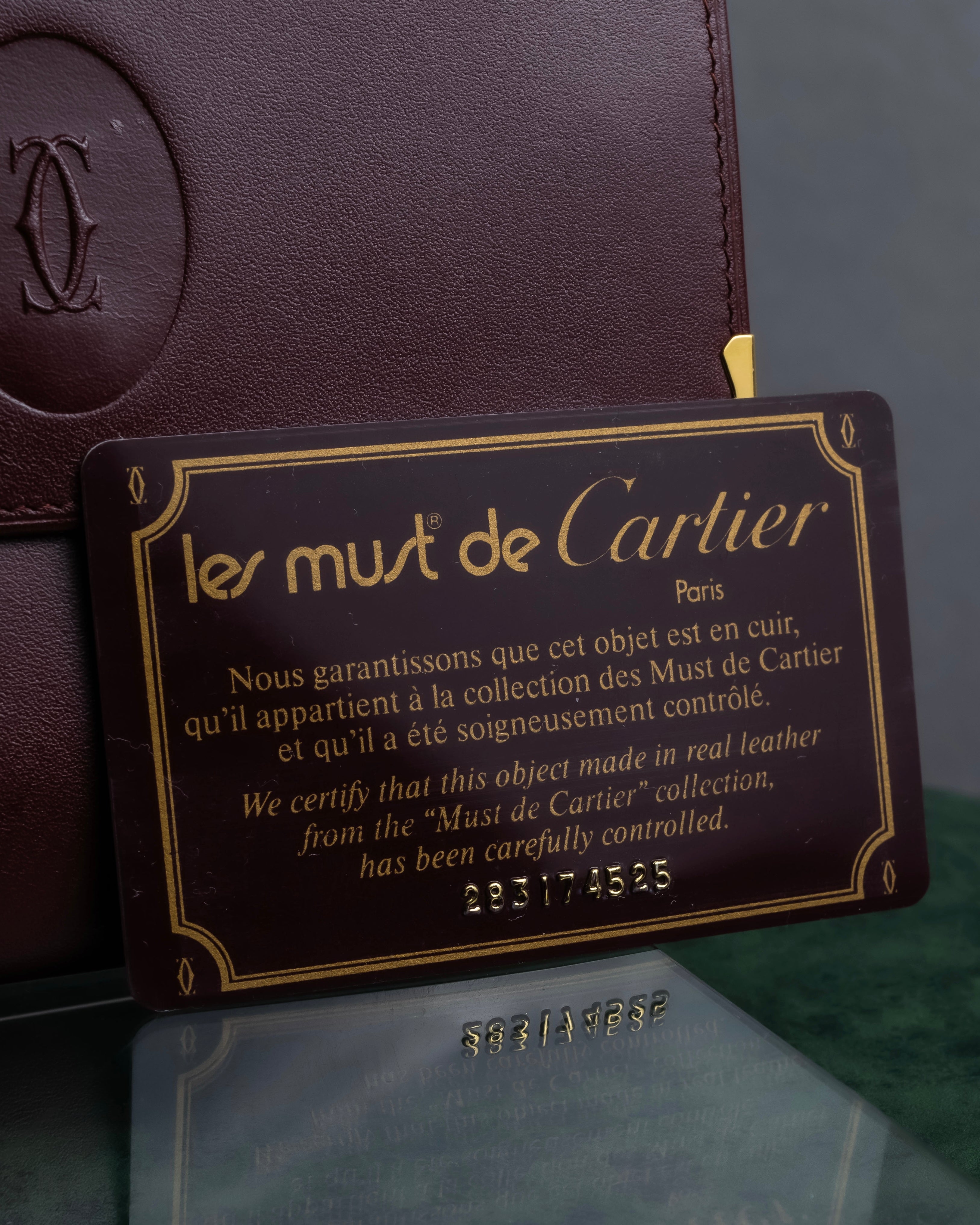 "Cartier" Les Must de Cartier bordeaux color leather wallet