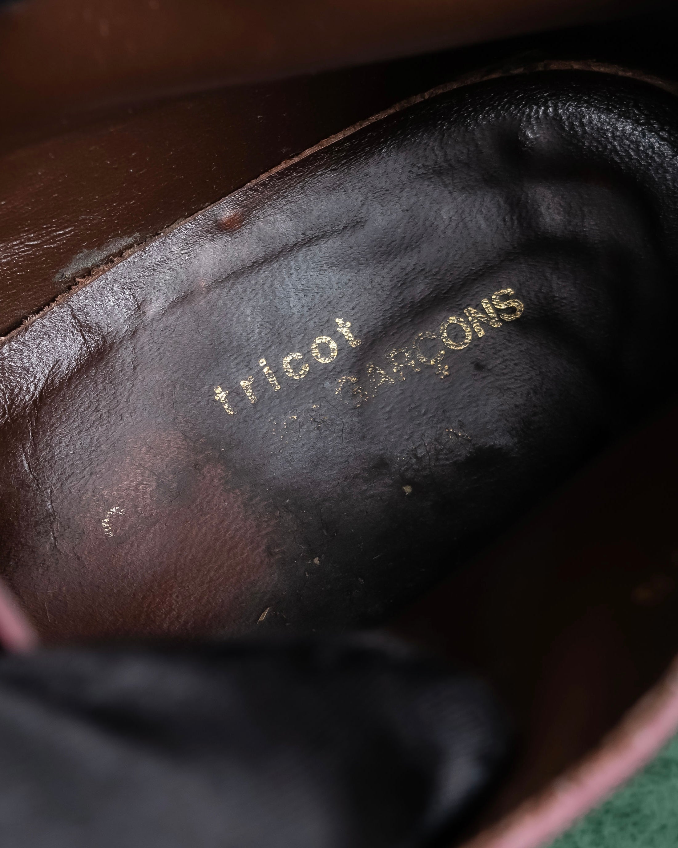 "tricot COMME des GARCONS"
 Belted heel leather pumps