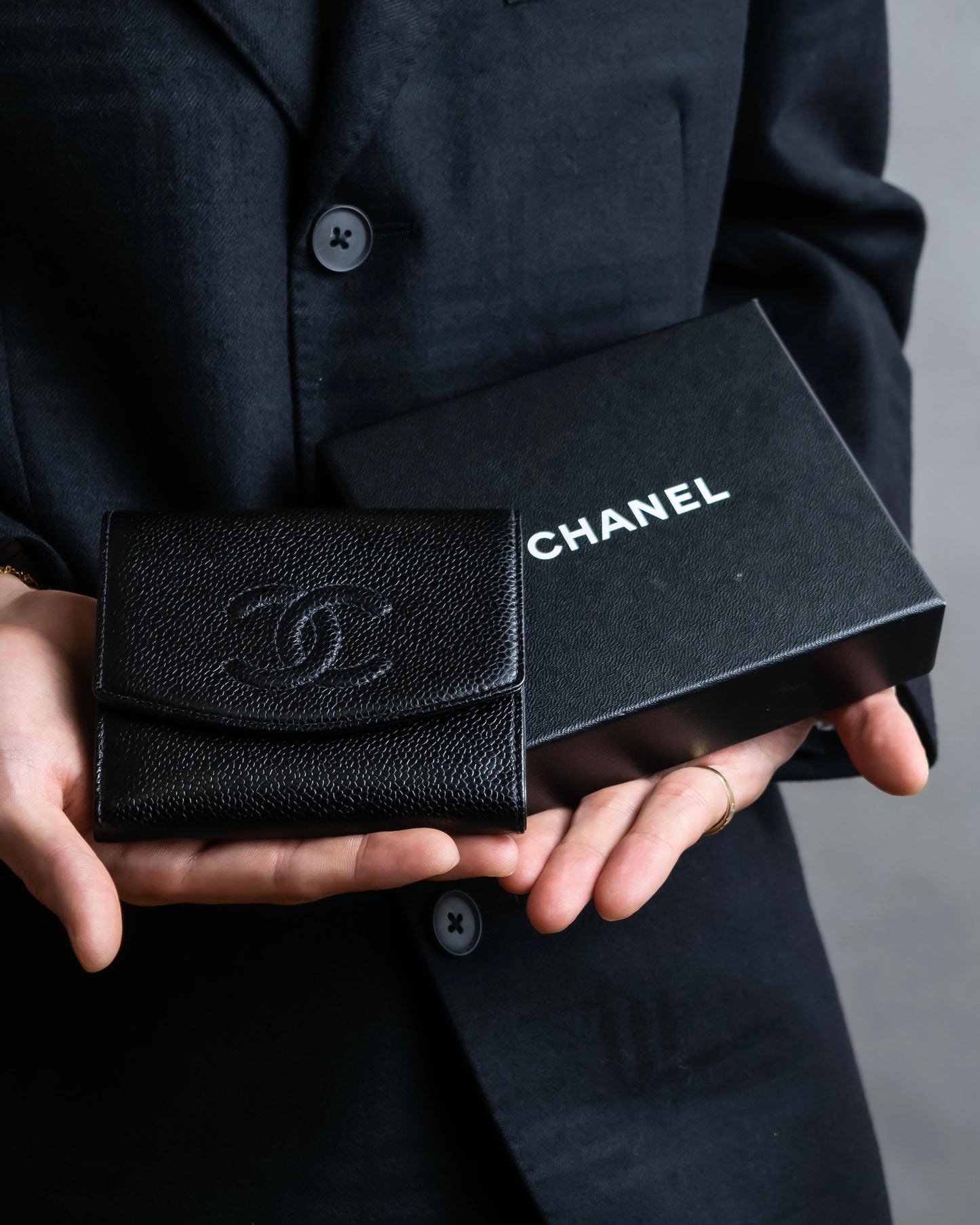 "CHANEL" Coco Mark engraved caviar skin bi fold wallet