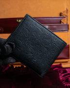 "Dior" Logo engraved bi-fold leather wallet