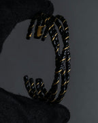 "MAISON MARGIELA" Twisted cord design brass bangle