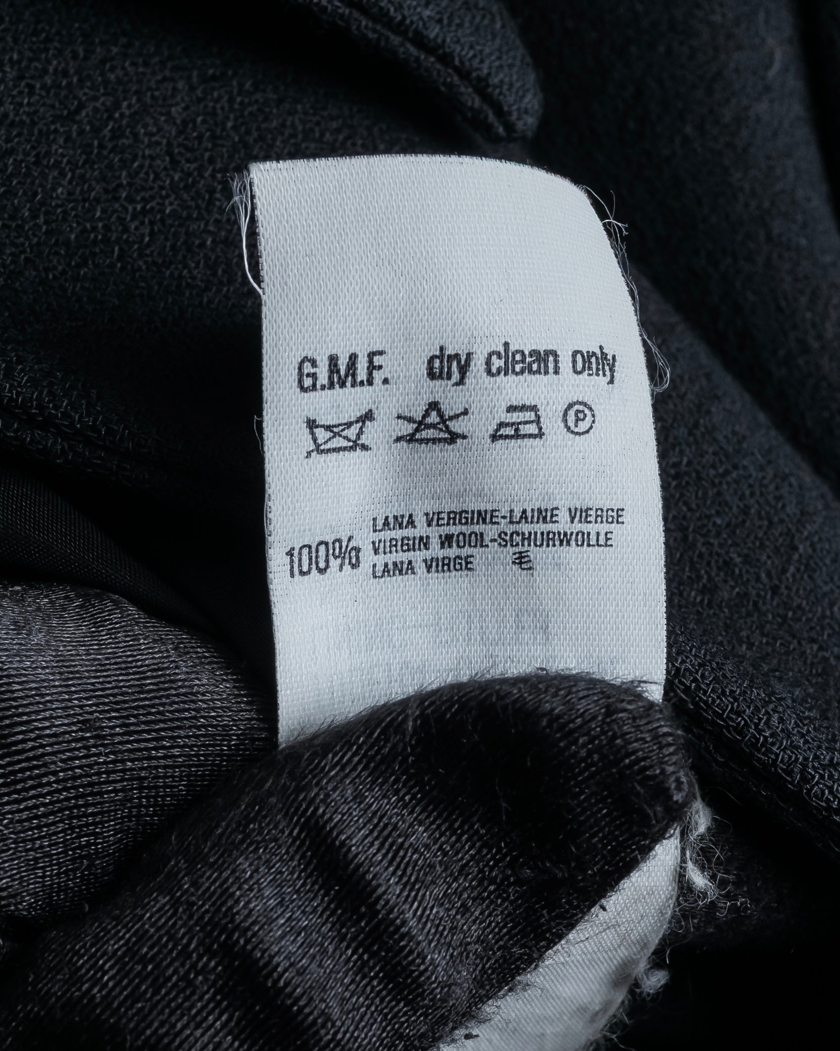 "GIANFRANCO FERRE" Multiple button sequences shaped long coat