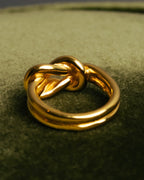 "HERMES" Sculptural gold tone knot Atame scarf ring