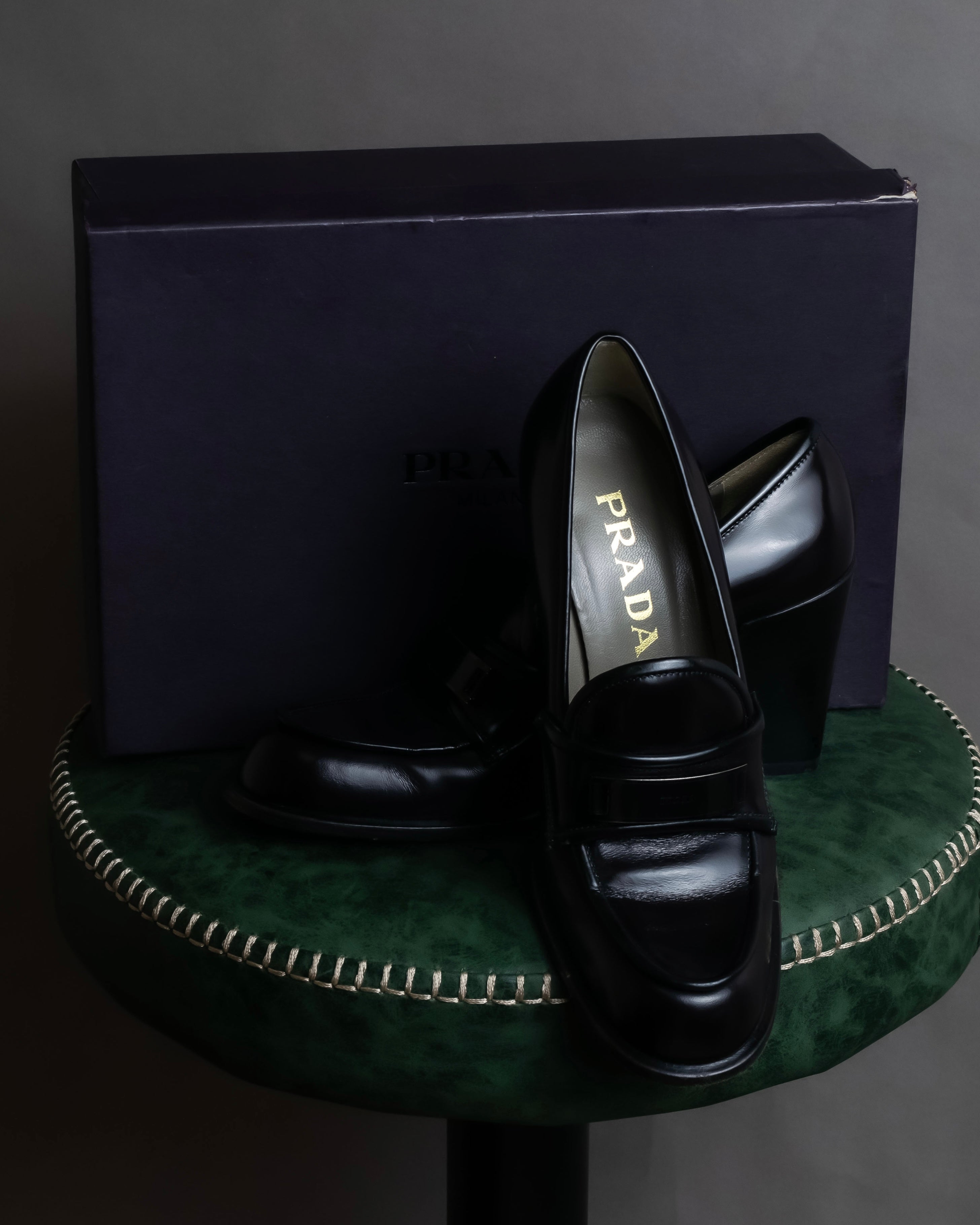 "PRADA" Metal band design leather heel loafers