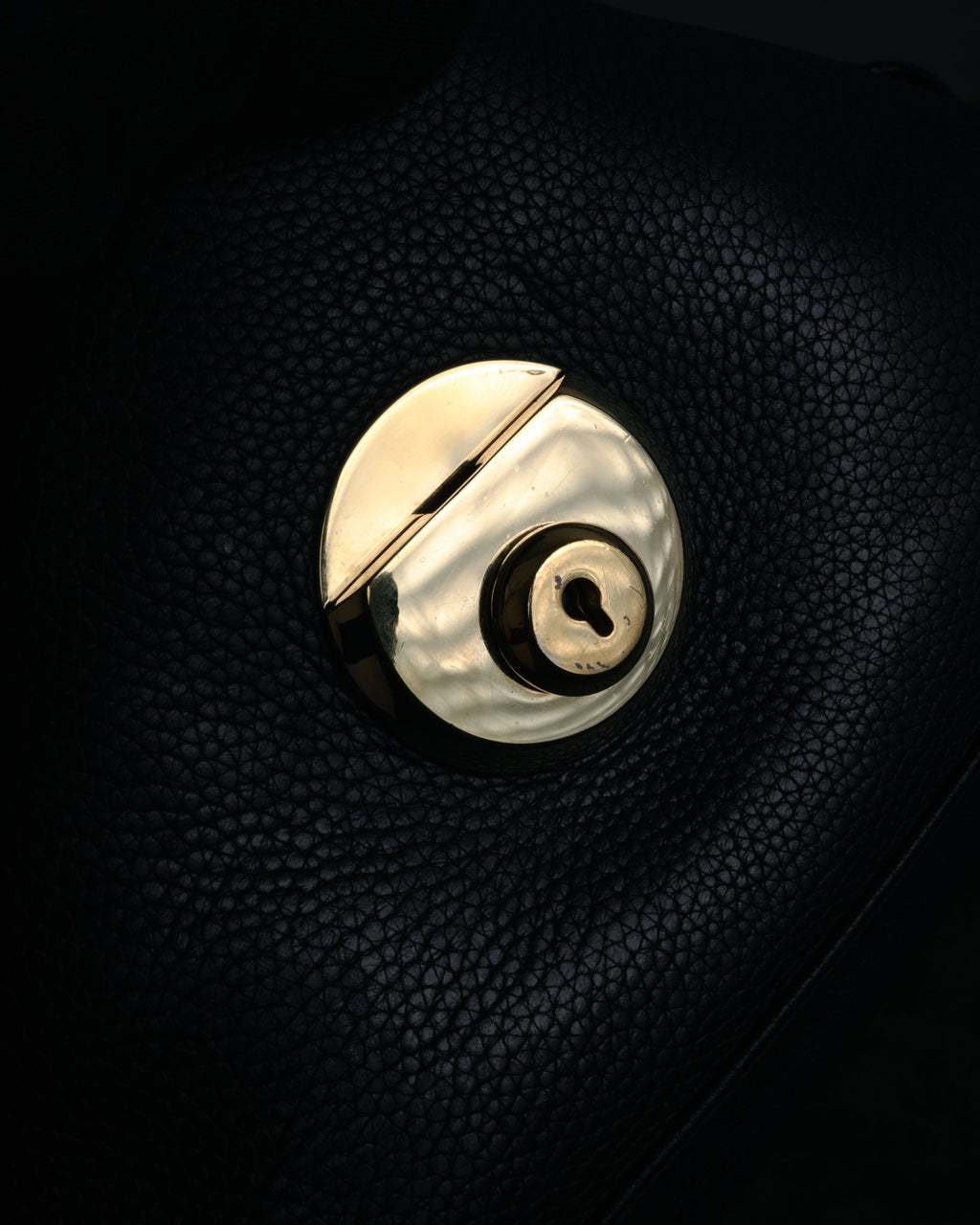 “Salvatore Ferragamo” 2000’s Pebbled leather turn lock bag