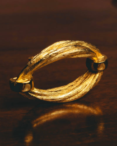 "Christian Dior" 70's Textured gold tone brooch