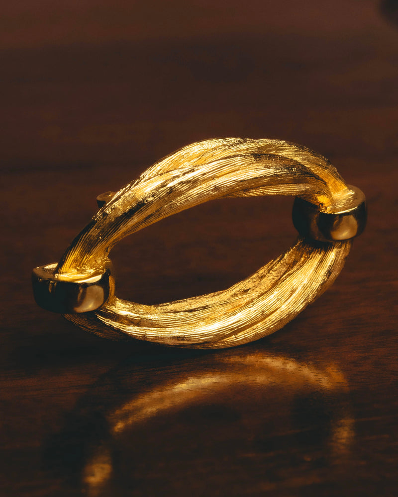 "Christian Dior" 70's Textured gold tone brooch