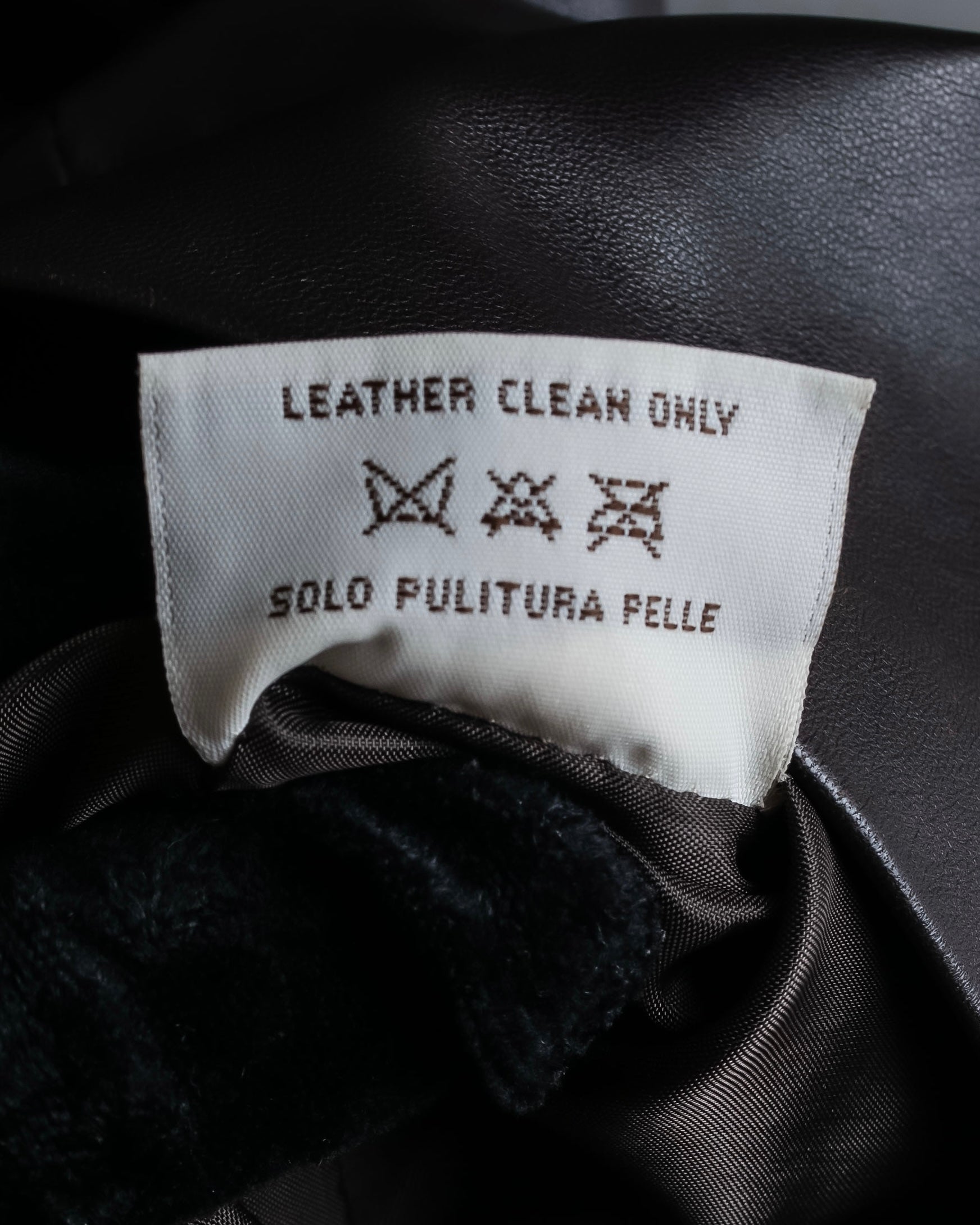 "HARVEY LOGAN" Diagonal cut design lamb leather flare skirt