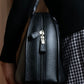 "MORABITO" Half moon design grained leather handbag