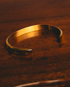 "Daniel Wellington" 20's Sleek gold cuff bracelet