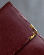 "Cartier" Les Must de Cartier bordeaux color leather wallet