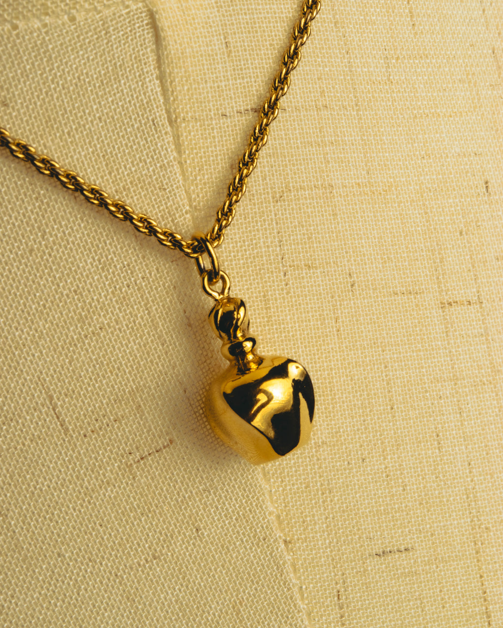 "Christian Dior" 80's-90's Gold tone bottle pendant necklace
