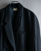 Tight-waisted wool shirt and black coat