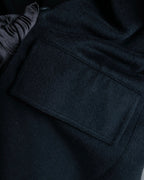 "GIANNI VERSACE UPDATE"
 Fur trimmed wool cashmere maxi double breasted coat