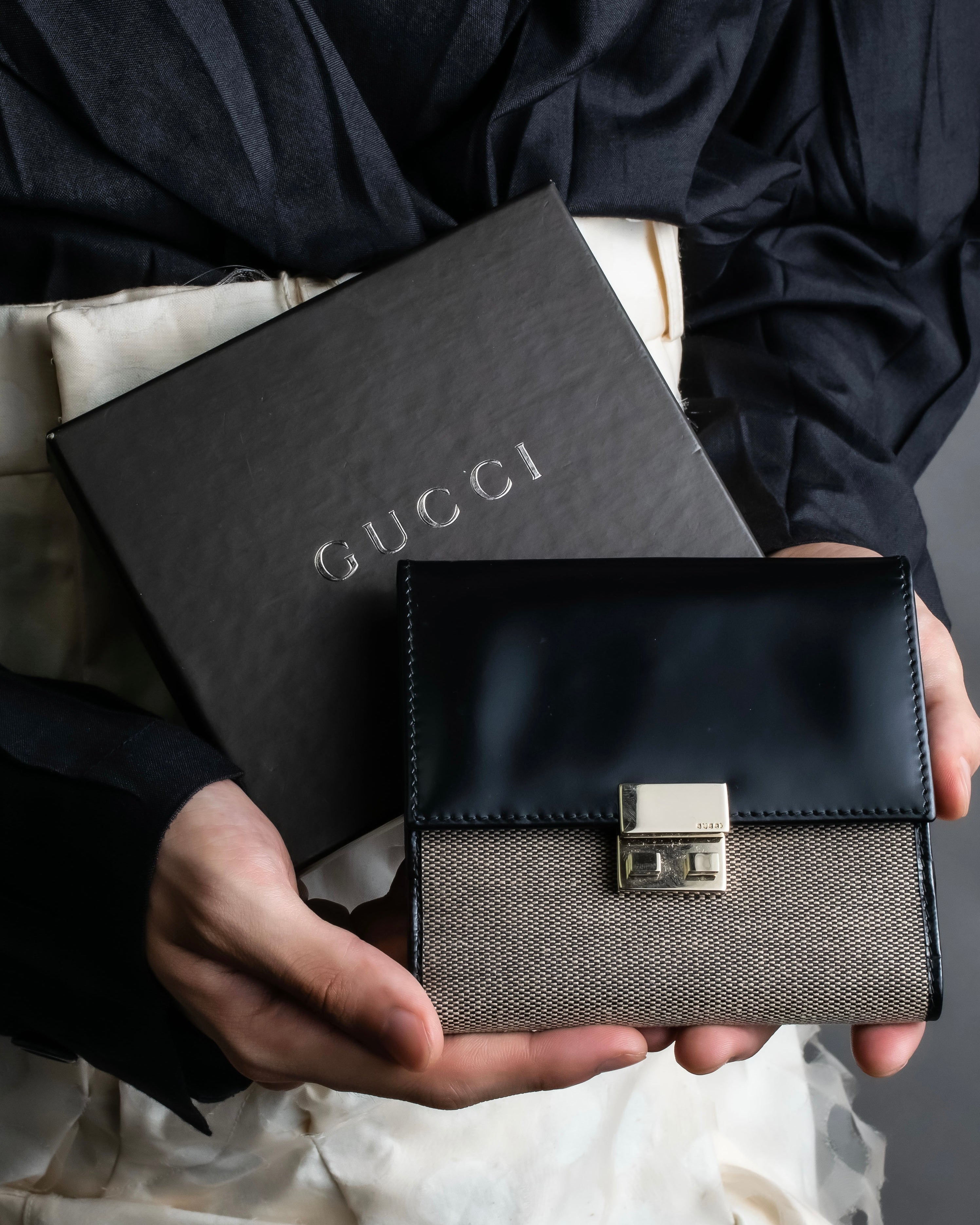"GUCCI" Canvas and leather bi-fold wallet
