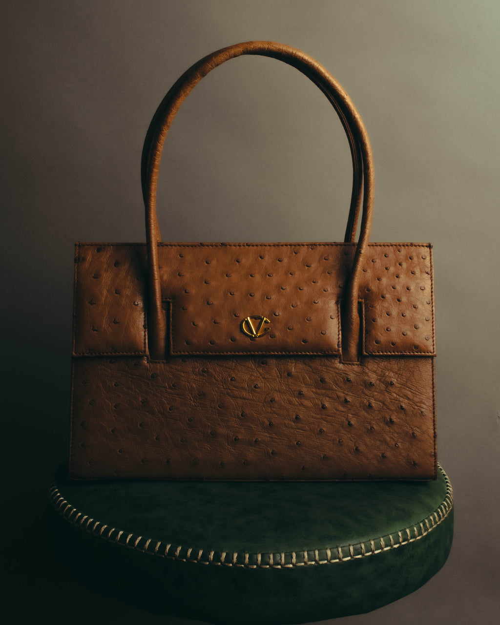“GIOVANNI VALENTINO” Structured ostrich top handle bag