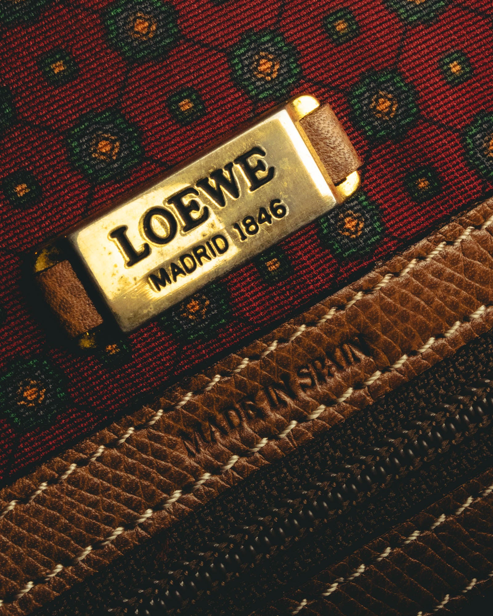 "LOEWE" 80s–00's logo embossed leather handbag