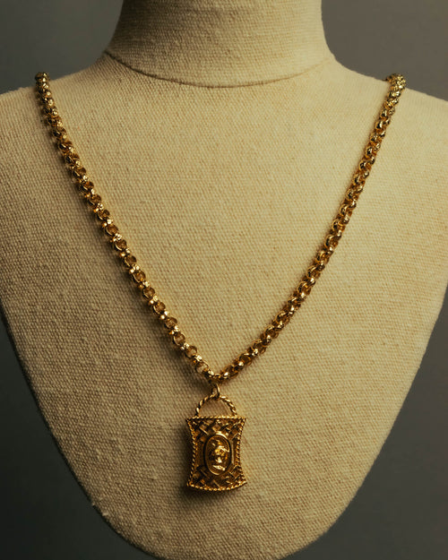 “NINA RICCI” Late 80’s-90’s gold tone openwork pendant necklace