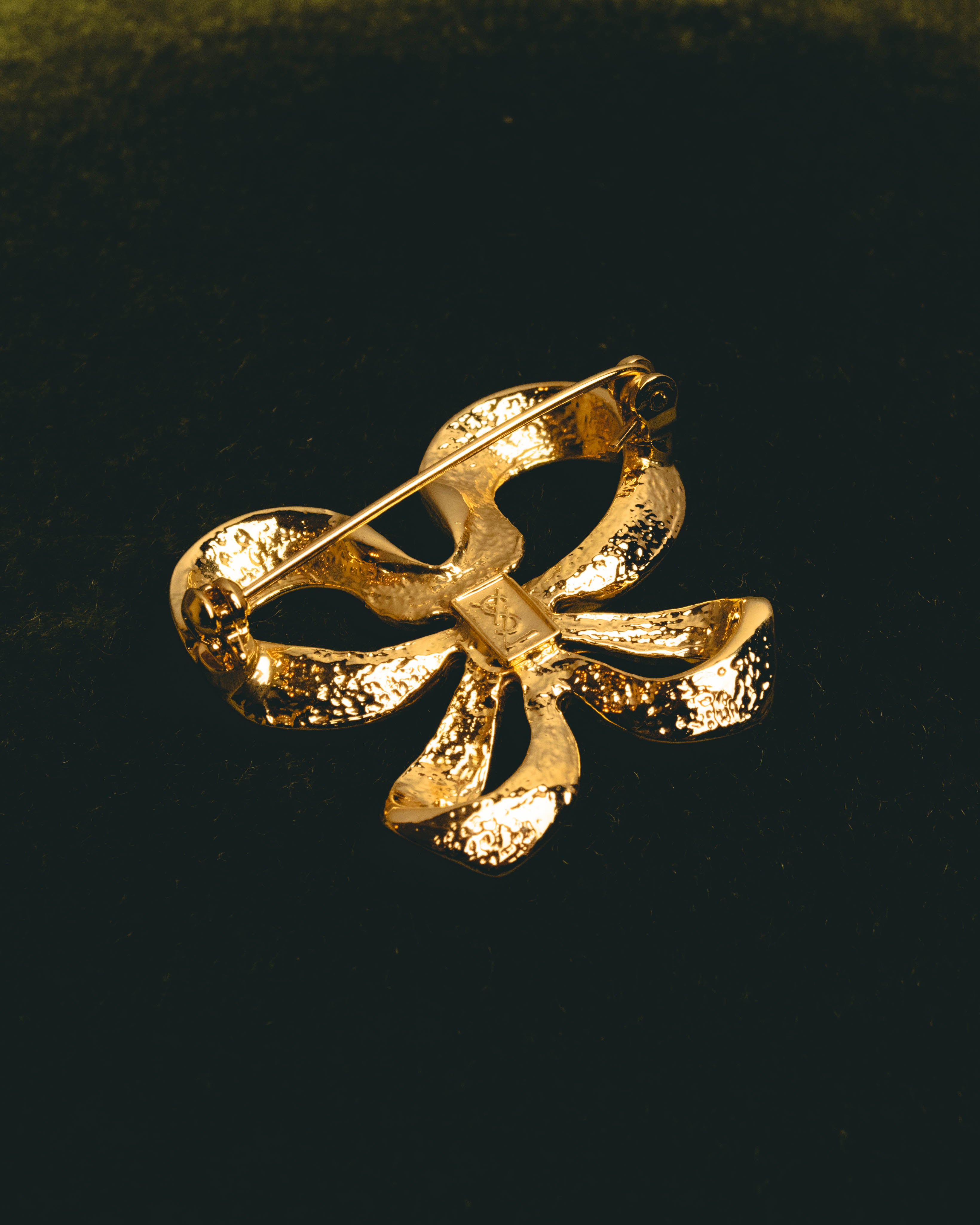"Yves Saint Laurent" Sculptural gold bow brooch