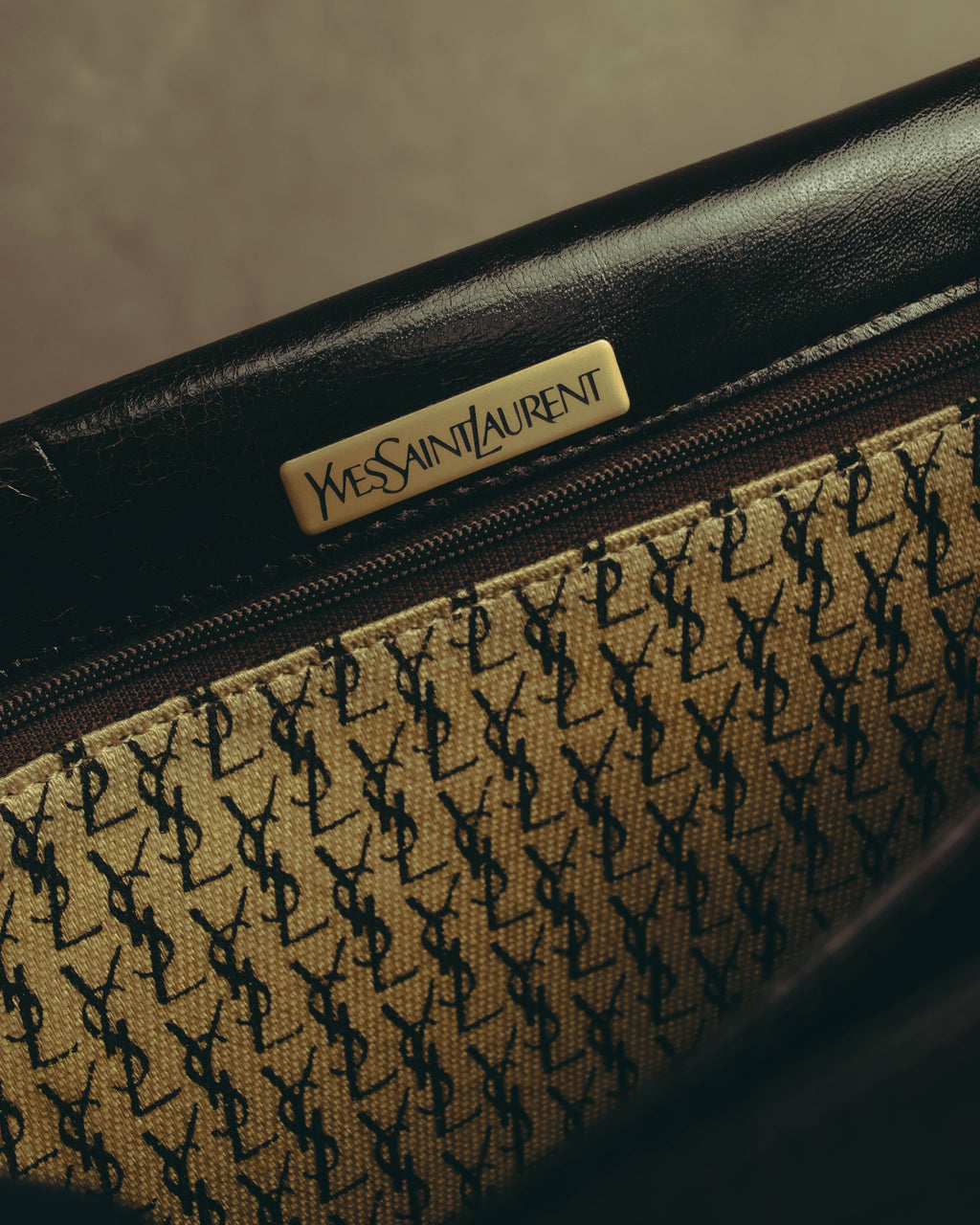 “Yves Saint Laurent” 70’s-80’s Perforated logo leather tassel shoulder bag