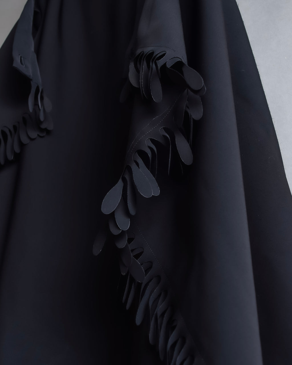 "ISSEY MIYAKE" Organic cutout fringe wrap skirt