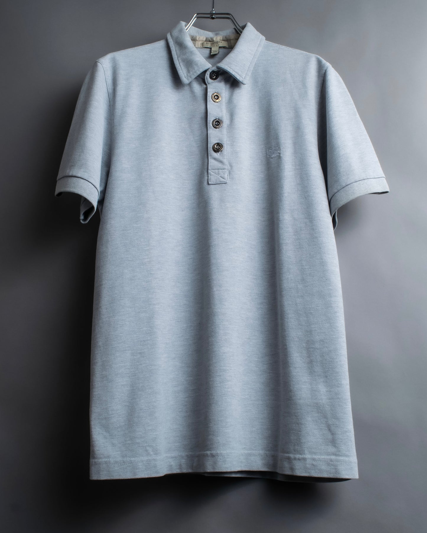 "BURBERRY" Knight logo engraved metal button polo shirt