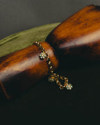 "Christian Dior" 00's-10's Floral rhinestone charm bracelet