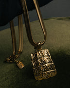"Yves Saint Laurent" 80's-00's Gold tone textured pendant necklace