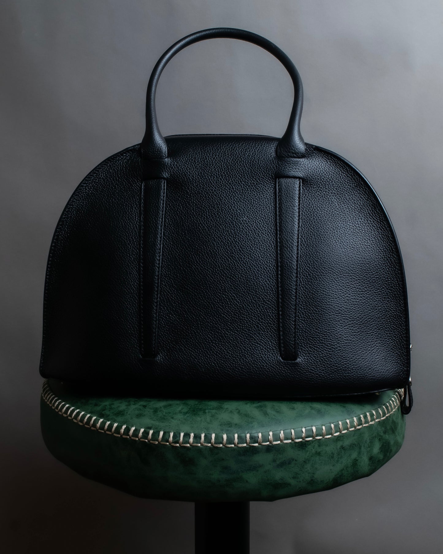 "MORABITO" Half moon design grained leather handbag