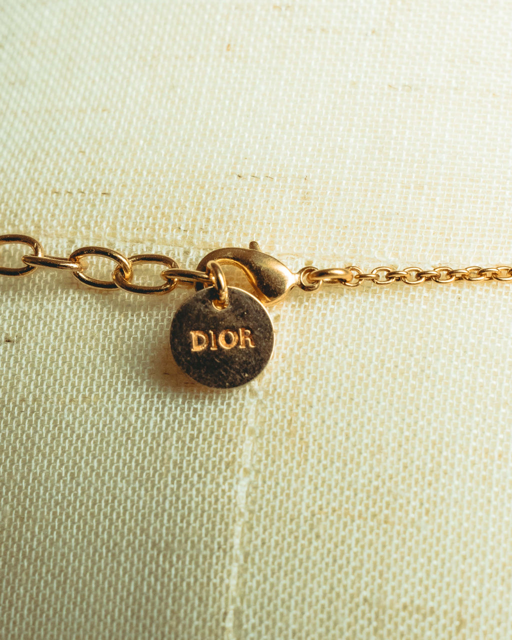 “Christian Dior” 2019-2025 Gold floral charm necklace with pearl accents