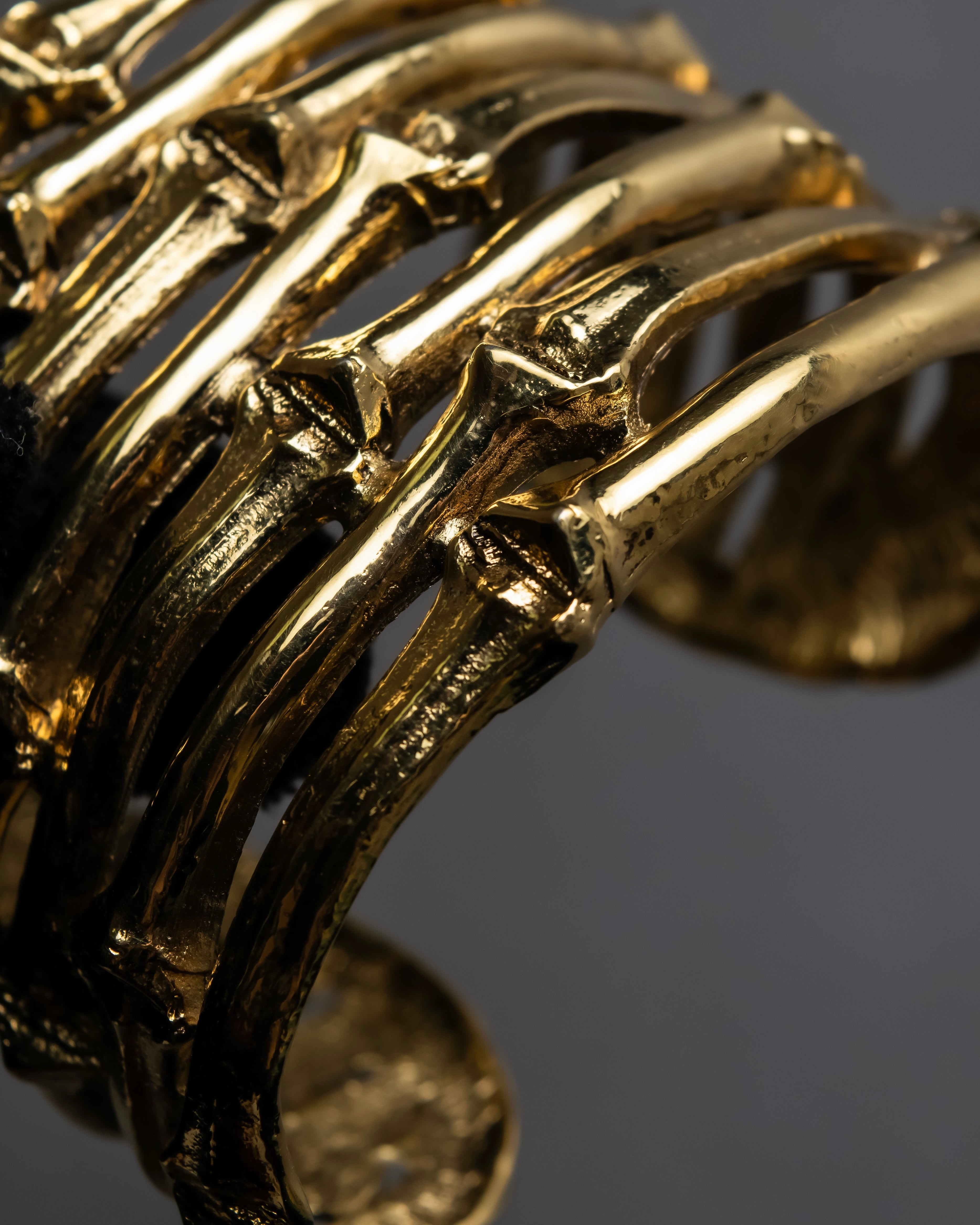 "YVES SAINT LAURENT" Skeletal arm shape design gold bangle