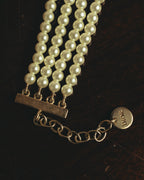 –SPECIAL– “Christian Dior” 2018-2025 Four-strand faux pearl bracelet with sculptural oval accents