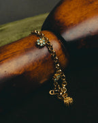 "Christian Dior" 00's-10's Floral rhinestone charm bracelet