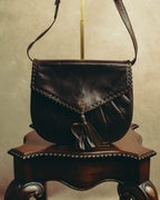 “Yves Saint Laurent” 70’s-80’s Perforated logo leather tassel shoulder bag