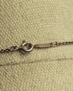 "Tiffany & Co." 80's-90's Sculptural triple bow necklace