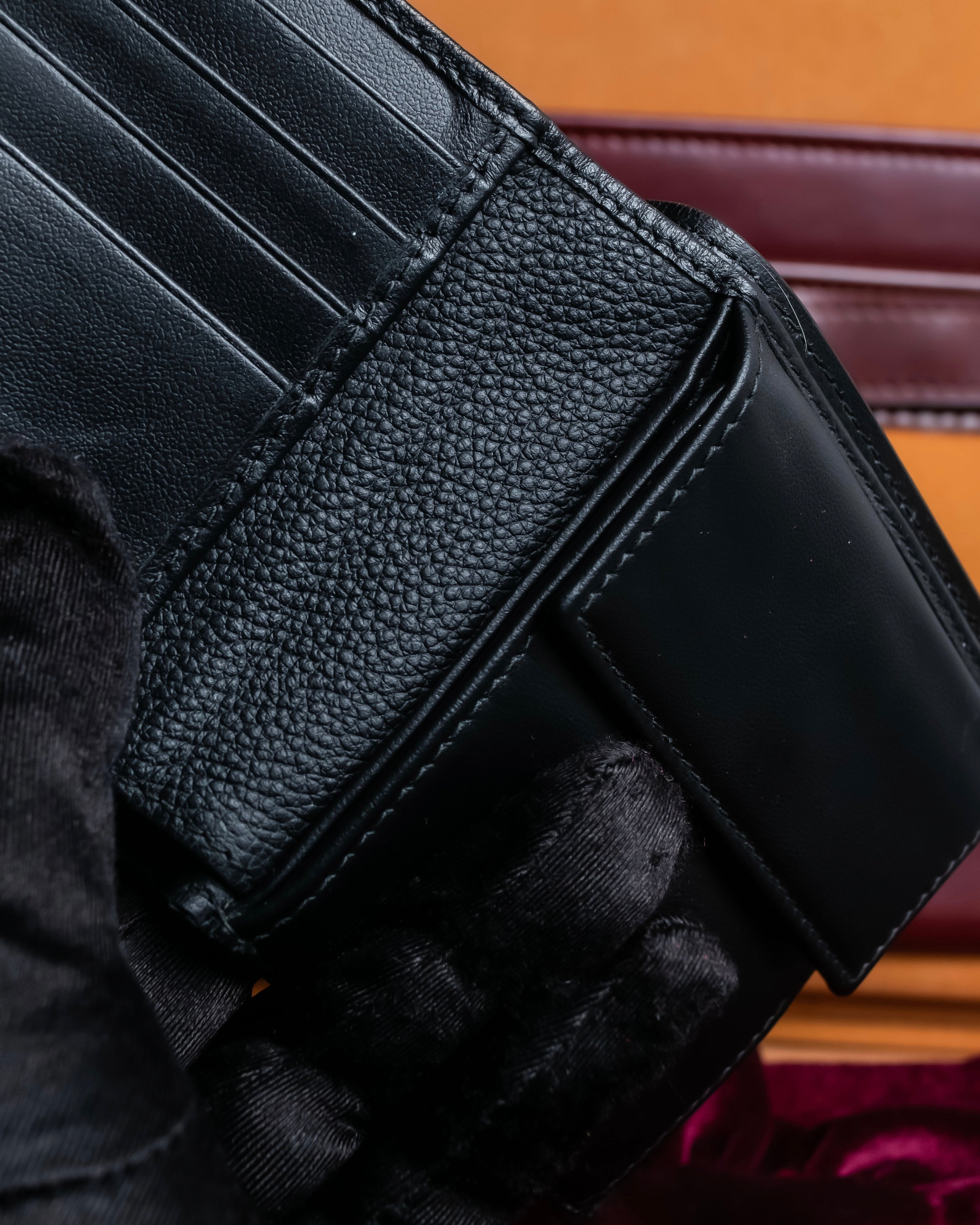 "Dior" Logo engraved bi-fold leather wallet