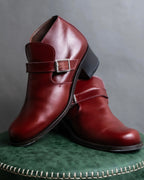 "tricot COMME des GARCONS"
 Belted heel leather pumps