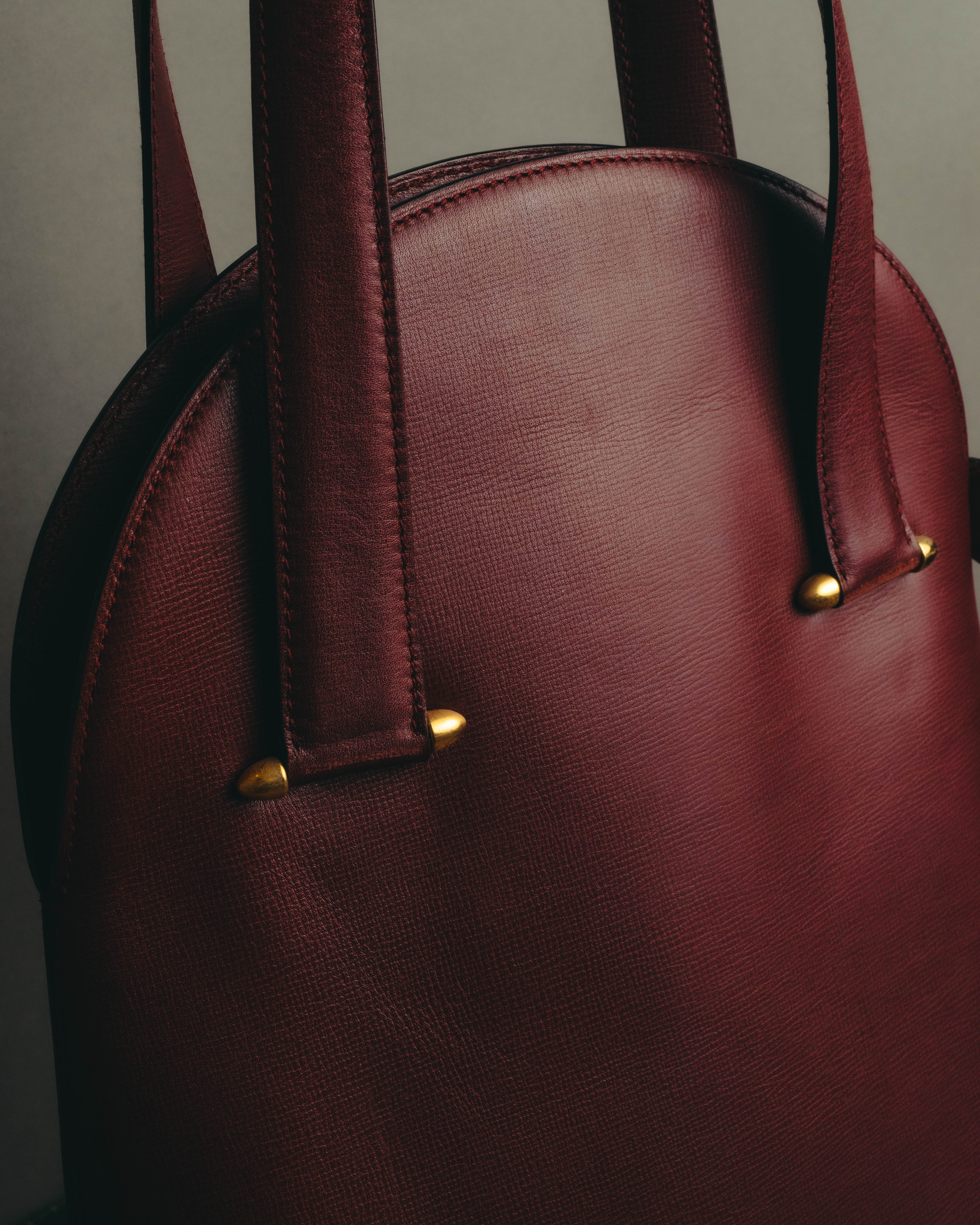 "Cartier" 80's-90's Bordeaux leather handbag