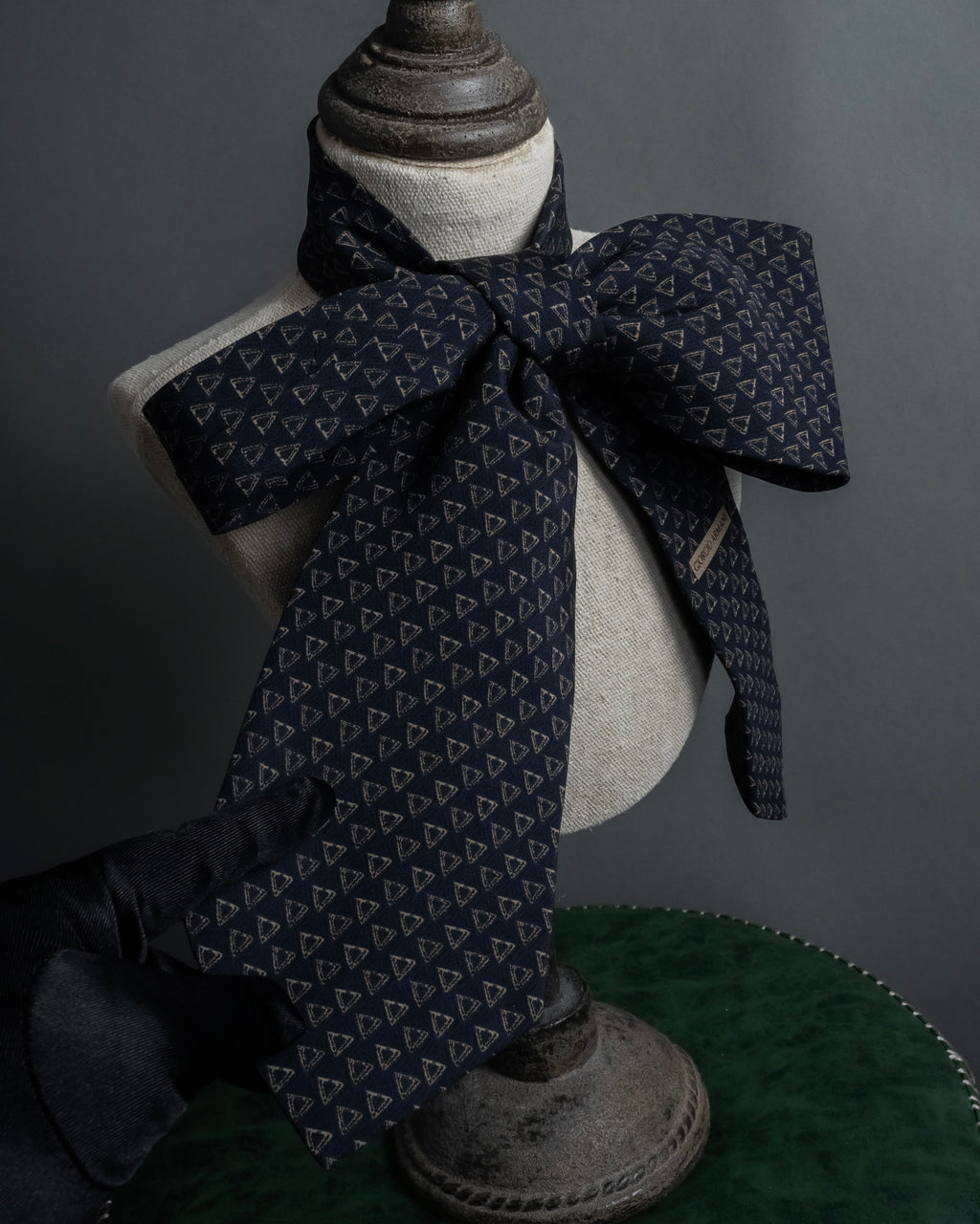 "ARMANI COLLEZIONI" Repeated triangle motif silk neck tie