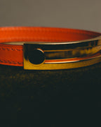 "Hermès" 00's Vibrant orange leather bracelet