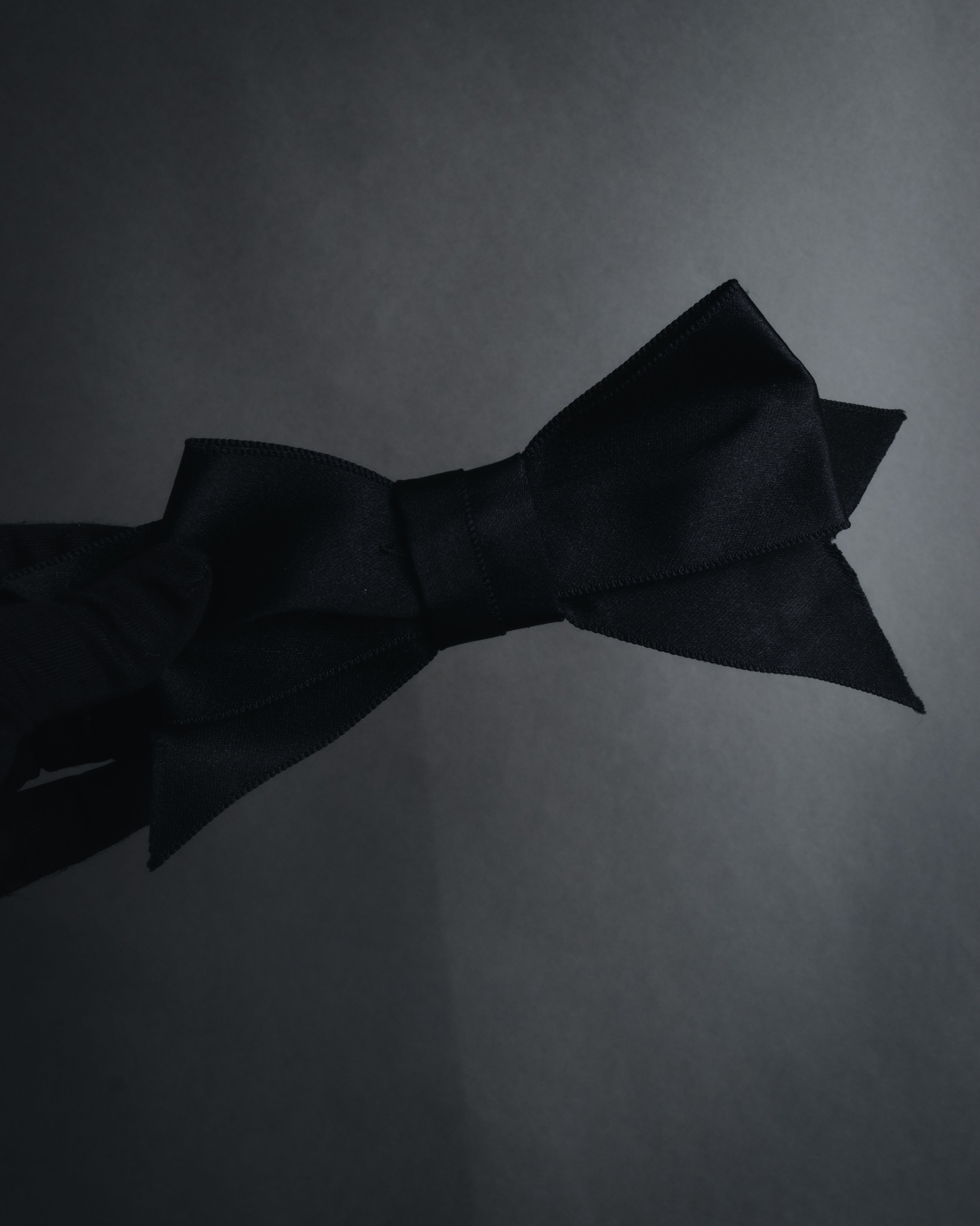 "CHANEL" 90’s black satin and grosgrain ribbon brooch