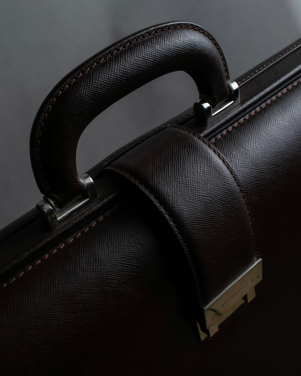 "BURBERRY" Metal belt design embossed PVC briefcase
