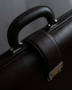 "BURBERRY" Metal belt design embossed PVC briefcase