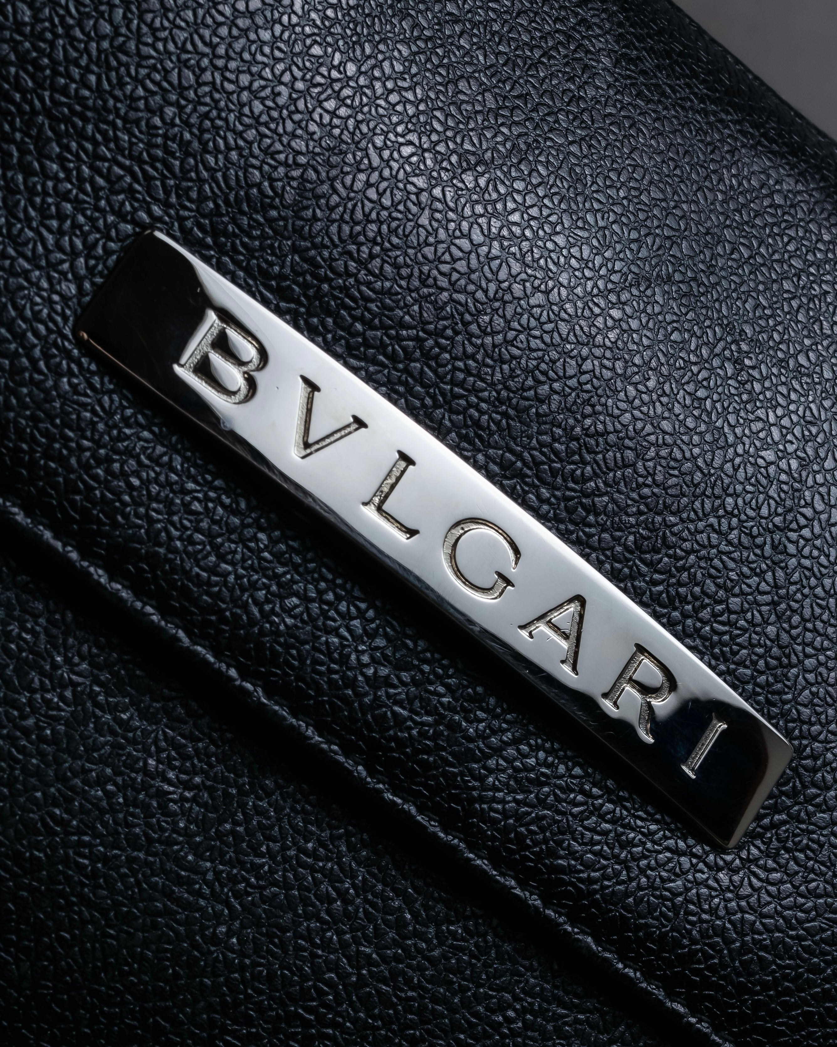 "BVLGARI" Horizontal form engraved logo leather bag