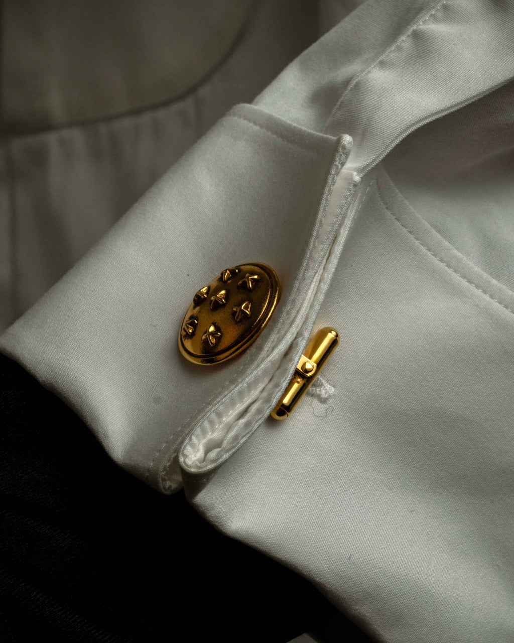 "CHANEL" Dome relief cross motif gold cufflinks