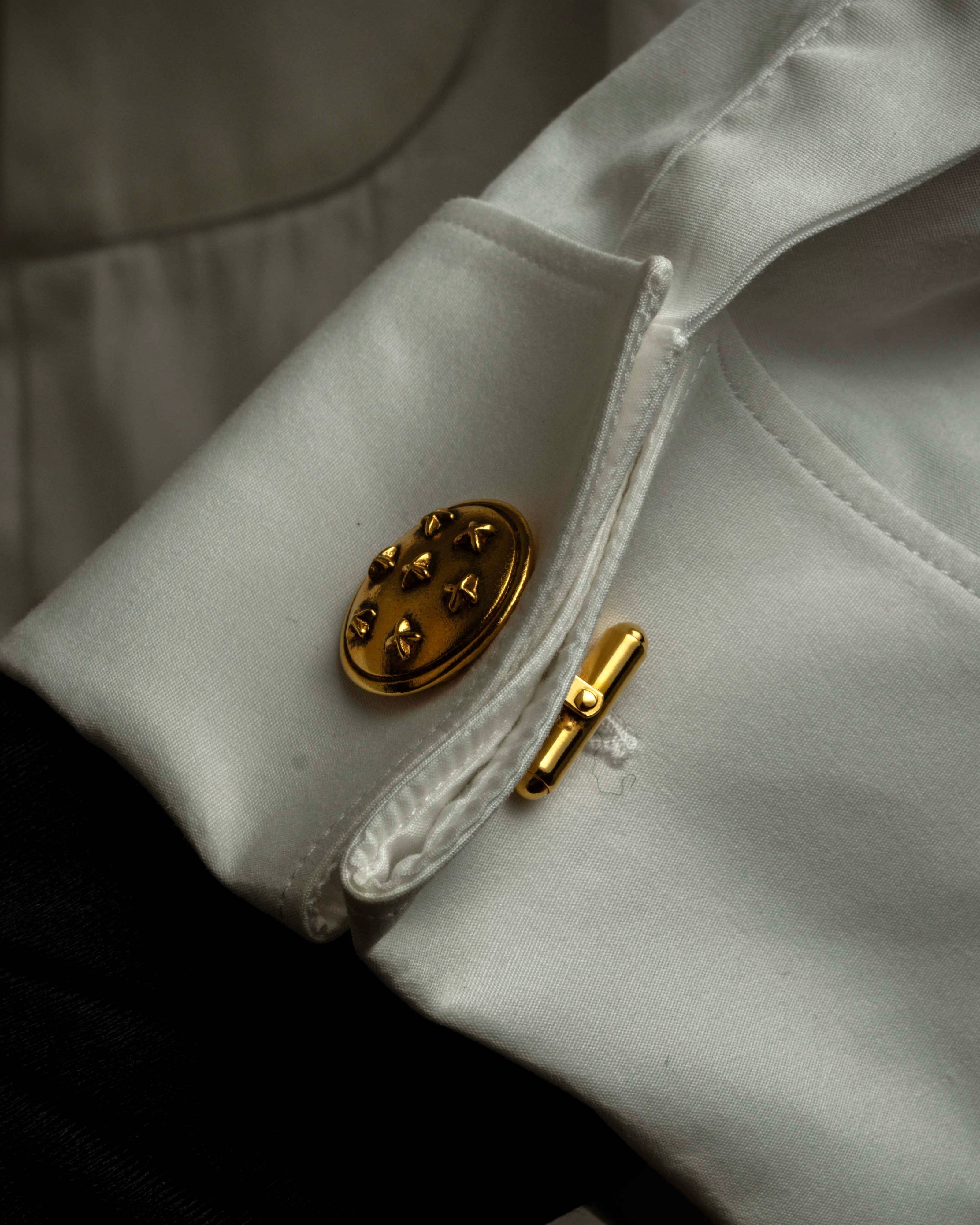 "CHANEL" Dome relief cross motif gold cufflinks