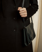 "Valentino Garavani" 80's Knot detail logo engraved dark green leather bag